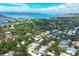 Discover your dream home in this picturesque neighborhood, encircled to showcase a unique property nestled among lush trees near the coast at 3837 Camino Real, Sarasota, FL 34239