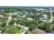 Neighborhood aerial view highlighting charming homes, mature trees, and streetscapes at 3837 Camino Real, Sarasota, FL 34239