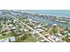 Birds eye view of a charming property within a community close to beaches and waterways at 404 Bayshore Rd, Nokomis, FL 34275