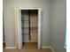 Spacious walk-in closet with metal shelving for ample storage and organization at 4077 River Bank Way, Punta Gorda, FL 33980