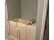 Accessible walk-in tub featuring safety grab bars and convenient faucet controls for a comfortable bathing experience at 4077 River Bank Way, Punta Gorda, FL 33980