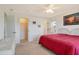 Bright bedroom with ceiling fan, closet and view of the water at 4484 Tortoise Rd, Venice, FL 34293