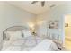 Bedroom featuring ceiling fan, closet, and neutral decor at 4625 Canoe Creek Ave, Parrish, FL 34219