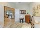 Entryway featuring tile floors and views into the home's dining and living areas at 4625 Canoe Creek Ave, Parrish, FL 34219