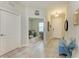 Foyer featuring tile floors, front door, and an entryway into an office at 4625 Canoe Creek Ave, Parrish, FL 34219