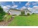 Charming home with a well-manicured lawn and attractive landscaping, creating great curb appeal at 4625 Canoe Creek Ave, Parrish, FL 34219