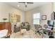 Office featuring chair, ottoman, a window, and artwork at 4625 Canoe Creek Ave, Parrish, FL 34219