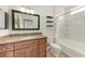 Bathroom featuring a vanity with granite countertop, toilet, and shower/tub combination at 4802 51St W St # 808, Bradenton, FL 34210