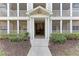 Condo building entrance with stairs and screened in porches on multiple floors at 4802 51St W St # 808, Bradenton, FL 34210