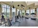 Bright community gym with exercise equipment and scenic views from the floor-to-ceiling windows at 4802 51St W St # 808, Bradenton, FL 34210