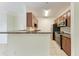 Eat-in kitchen with breakfast bar, granite countertops, and stainless steel appliances at 4802 51St W St # 808, Bradenton, FL 34210