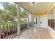 Serene porch with tile flooring and views of the community's lush landscape at 4802 51St W St # 808, Bradenton, FL 34210