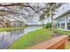 Scenic view of a community lake with condo buildings visible from deck at 4802 51St W St # 808, Bradenton, FL 34210