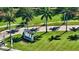 Aerial view of Cresswind community entrance with landscaped grounds and palm trees at 5187 Barnett Cir, Lakewood Ranch, FL 34211