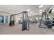 Modern fitness center with state-of-the-art equipment and plenty of natural light at 5187 Barnett Cir, Lakewood Ranch, FL 34211