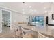 Open kitchen concept featuring a large island, recessed lighting, and granite countertops at 5187 Barnett Cir, Lakewood Ranch, FL 34211