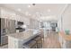 Modern kitchen with granite countertops, stainless steel appliances, and hardwood floors at 5187 Barnett Cir, Bradenton, FL 34211