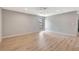 Well lit room featuring wood floors, neutral walls and a window at 5192 Cedar Hammock Ln, Sarasota, FL 34232
