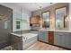 Modern bathroom with double vanity, soaking tub, and sleek tiled shower at 5240 Bentgrass Way, Bradenton, FL 34211