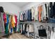 Walk-in closet offering ample storage with organized shelving and hanging rods at 5240 Bentgrass Way, Bradenton, FL 34211