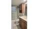 Cozy bathroom featuring an updated vanity, shower, and tub combination at 5325 Murdock Ave, Sarasota, FL 34231