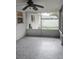 Screened porch with patterned tile floor overlooking backyard at 5325 Murdock Ave, Sarasota, FL 34231