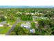 Aerial view highlighting property location within the surrounding neighborhood and lush greenery at 5329 Ansonia Ter, North Port, FL 34287