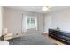 Bedroom featuring wood-look flooring and one window providing natural light at 5329 Ansonia Ter, North Port, FL 34287