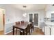 Well-lit dining room with a view of the entryway at 5329 Ansonia Ter, North Port, FL 34287