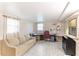 Multi-use office or flex room with a comfortable sofa and ample workspace at 5329 Ansonia Ter, North Port, FL 34287