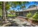 Enclosed patio on a beautiful home with mature landscaping and plenty of privacy at 5356 Royal Palm Ave # 5356, Sarasota, FL 34234