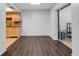 Bright kitchen area showcasing modern wood-look floors and efficient layout at 5356 Royal Palm Ave # 5356, Sarasota, FL 34234
