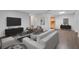 Bright living room features hardwood floors, modern furniture, and minimalist décor at 5356 Royal Palm Ave # 5356, Sarasota, FL 34234