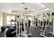 Well-equipped fitness center with modern exercise machines and mirrored walls at 5459 Bentgrass Dr # 2-116, Sarasota, FL 34235