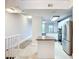 Modern kitchen featuring stainless steel appliances, granite countertops and tile flooring at 5459 Bentgrass Dr # 2-116, Sarasota, FL 34235