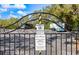 Las Palmas Recreational Vehicle Parking Lot secured by a black metal gate at 5459 Bentgrass Dr # 2-116, Sarasota, FL 34235