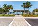 Beach entrance featuring covered picnic area and restrooms at 5600 Beach Way Dr # 201, Sarasota, FL 34242