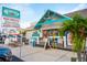 Exterior of a boat rental shop with colorful signage and displays at 5600 Beach Way Dr # 201, Sarasota, FL 34242
