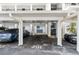 Assigned parking spot 201 within well maintained covered parking area, with easy access to the building at 5600 Beach Way Dr # 201, Sarasota, FL 34242