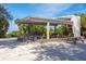 Open-air pavilion with picnic tables, perfect for a shaded lunch near the sandy shores at 5600 Beach Way Dr # 201, Sarasota, FL 34242