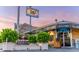 Charming seafood restaurant featuring a nautical-themed exterior with lush greenery and outdoor seating at 5600 Beach Way Dr # 201, Sarasota, FL 34242