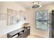 Bright breakfast nook with modern lighting and decor adjacent to the kitchen at 6024 28Th W St, Bradenton, FL 34207