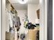 Walk-in closet with clothing racks, shelves, and storage bins for optimal organization at 6024 28Th W St, Bradenton, FL 34207