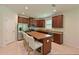Well-equipped kitchen featuring granite countertops, stainless steel appliances, and ample cabinet space at 6204 Horse Mill Pl, Palmetto, FL 34221