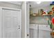 Convenient laundry room area featuring a modern washer and dryer set at 6515 Grand Estuary Trl # 208, Bradenton, FL 34212