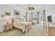 Bright main bedroom with large windows and neutral decor at 7214 Marlow Pl, University Park, FL 34201