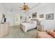 Bright main bedroom with neutral decor and lots of natural light at 7214 Marlow Pl, University Park, FL 34201