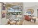 Cozy breakfast nook with pool views provides the perfect spot to relax at 7214 Marlow Pl, University Park, FL 34201