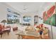 Bright living room with a view of the pool, comfortable furniture, and stylish decor at 7214 Marlow Pl, University Park, FL 34201