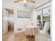 Bright breakfast nook with a round table, sliding glass doors, and access to the outdoor patio at 7460 Dickens Dr, Sarasota, FL 34231